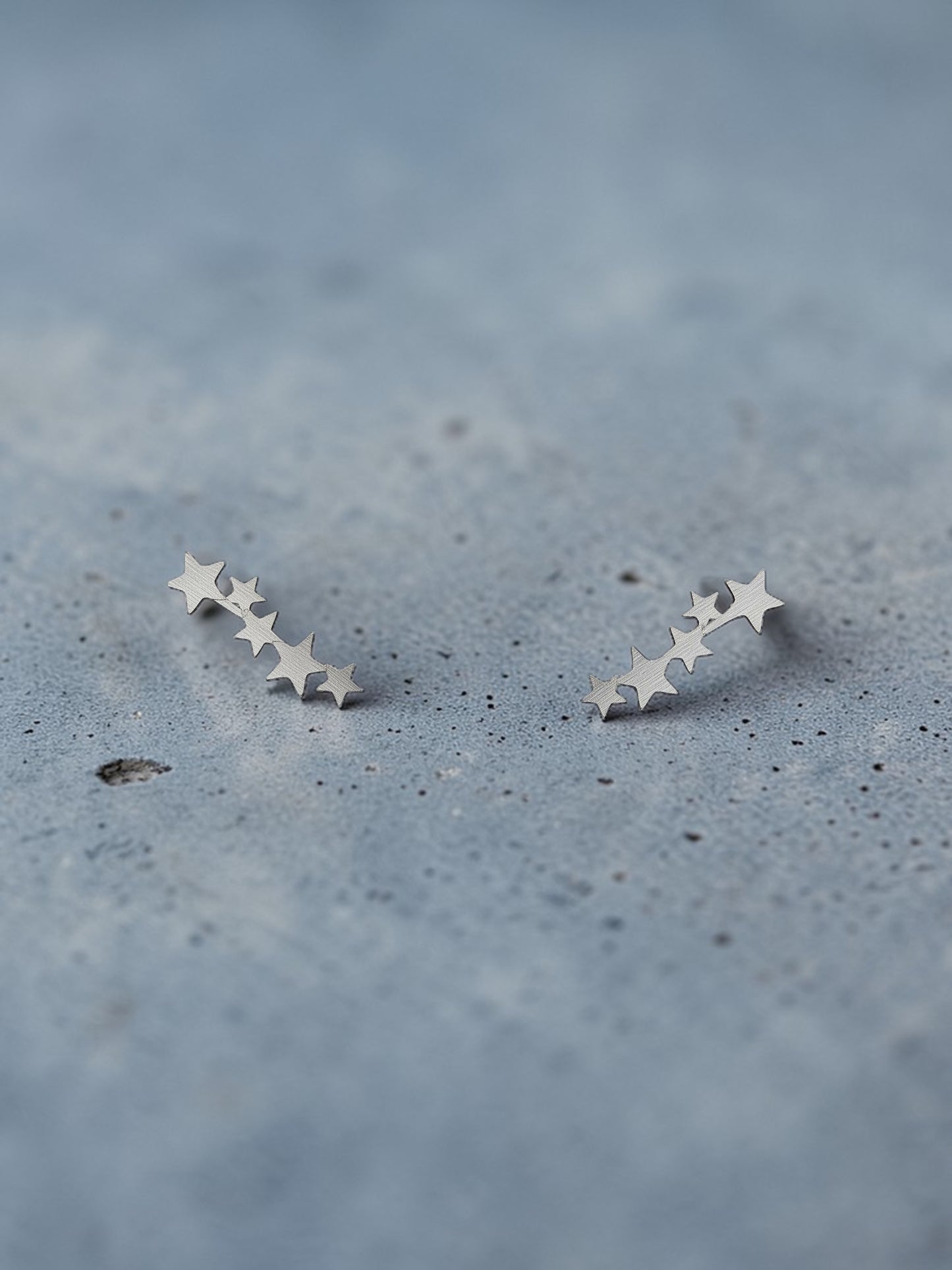 Aretes constelación plateados